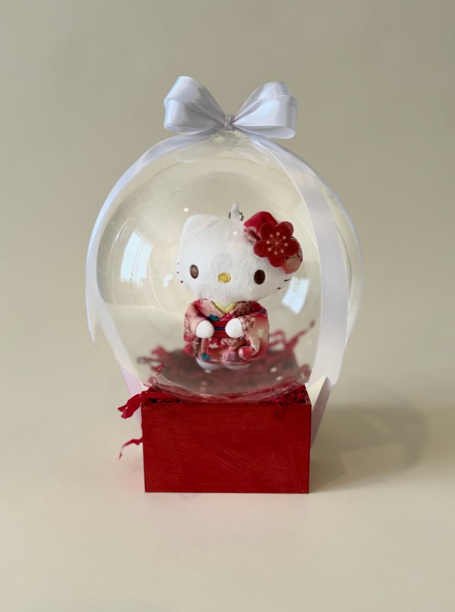 Kitty llavero peluche en globo burbuja